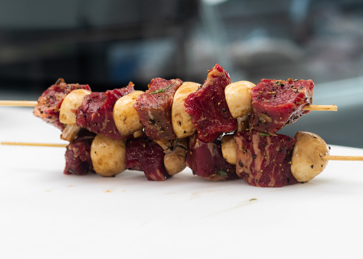 Raw beef and mushroom skewers