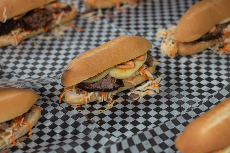 HQ's wagyu brisket sandwich on a fresh bun