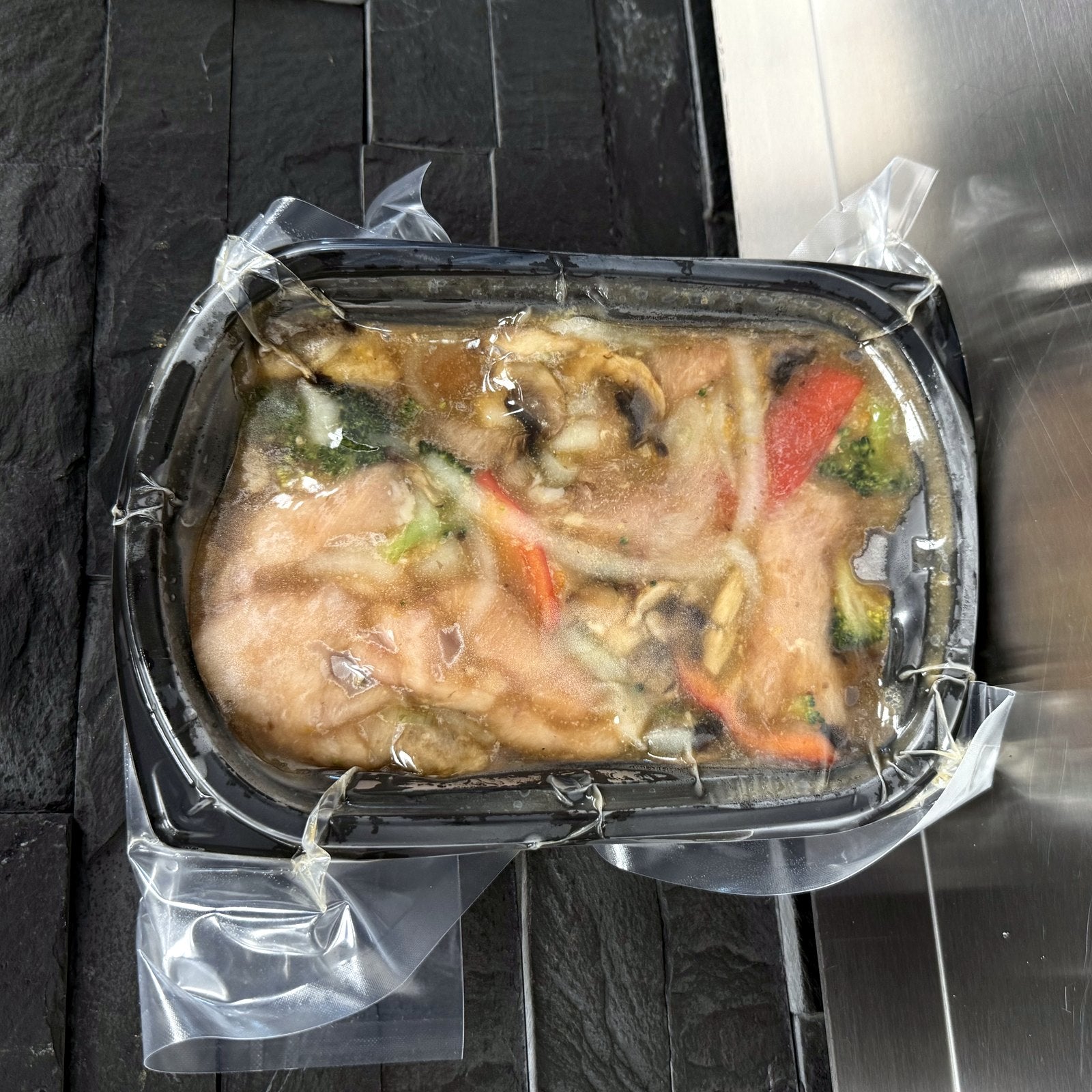HQ's orange ginger chicken stir fry, packaged